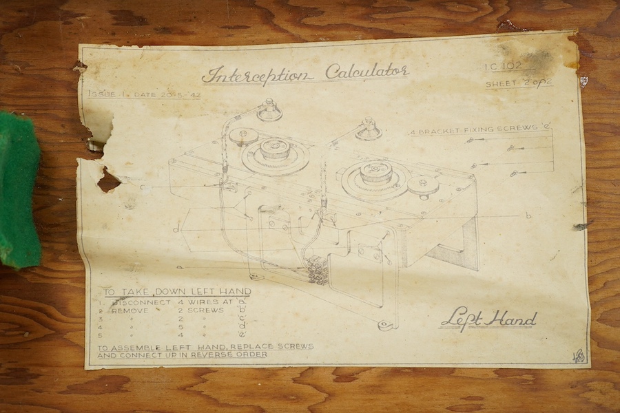 An Air Ministry First World War cased tank inspection lamp, 78cm long, together with a cased Air Ministry Interception Calculator, plywood case; 71cm wide, 24cm deep, 24cm high. Condition poor to fair.
